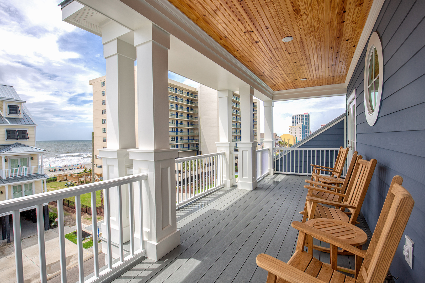 The Santee home plan at living dunes is Lowcountry style and features two porches overlooking the lake