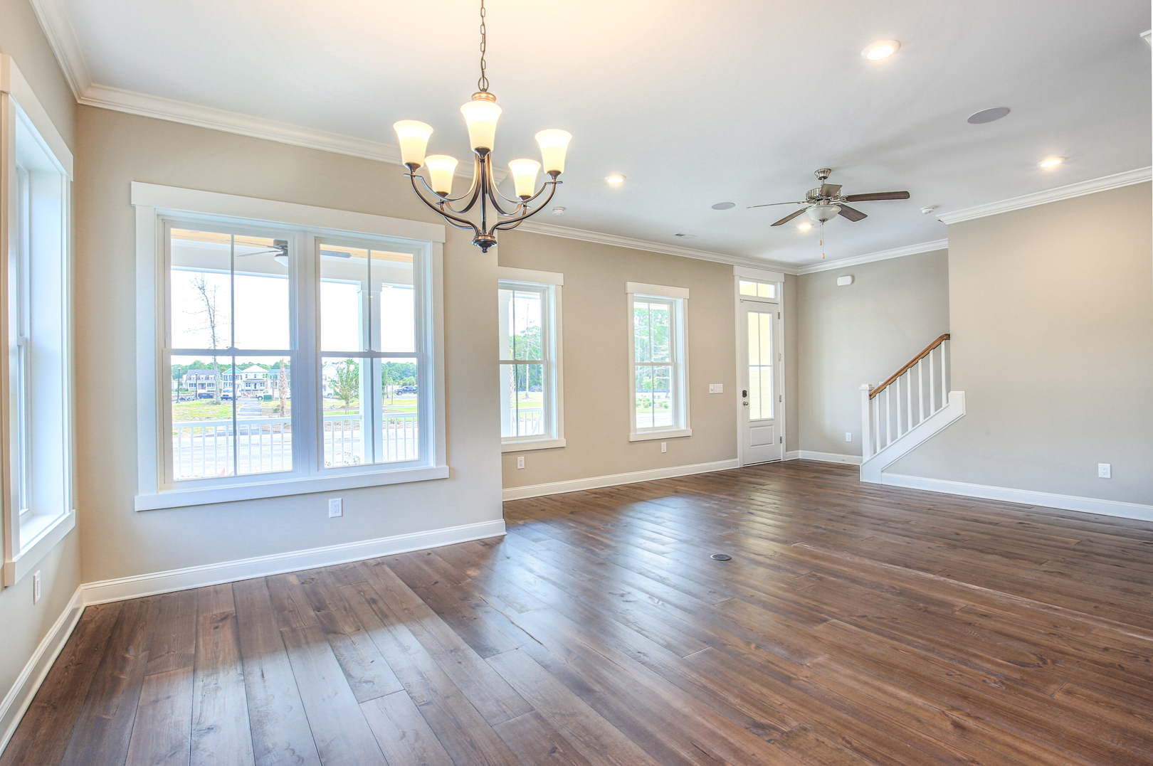 The Santee home plan at living dunes is Lowcountry style and features two porches overlooking the lake