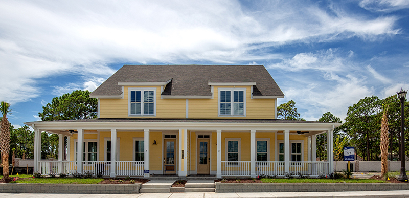 The Santee home plan at living dunes is Lowcountry style and features two porches overlooking the lake