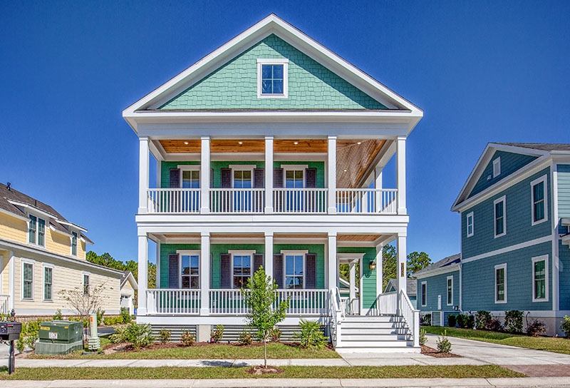 The Santee home plan at living dunes is Lowcountry style and features two porches overlooking the lake